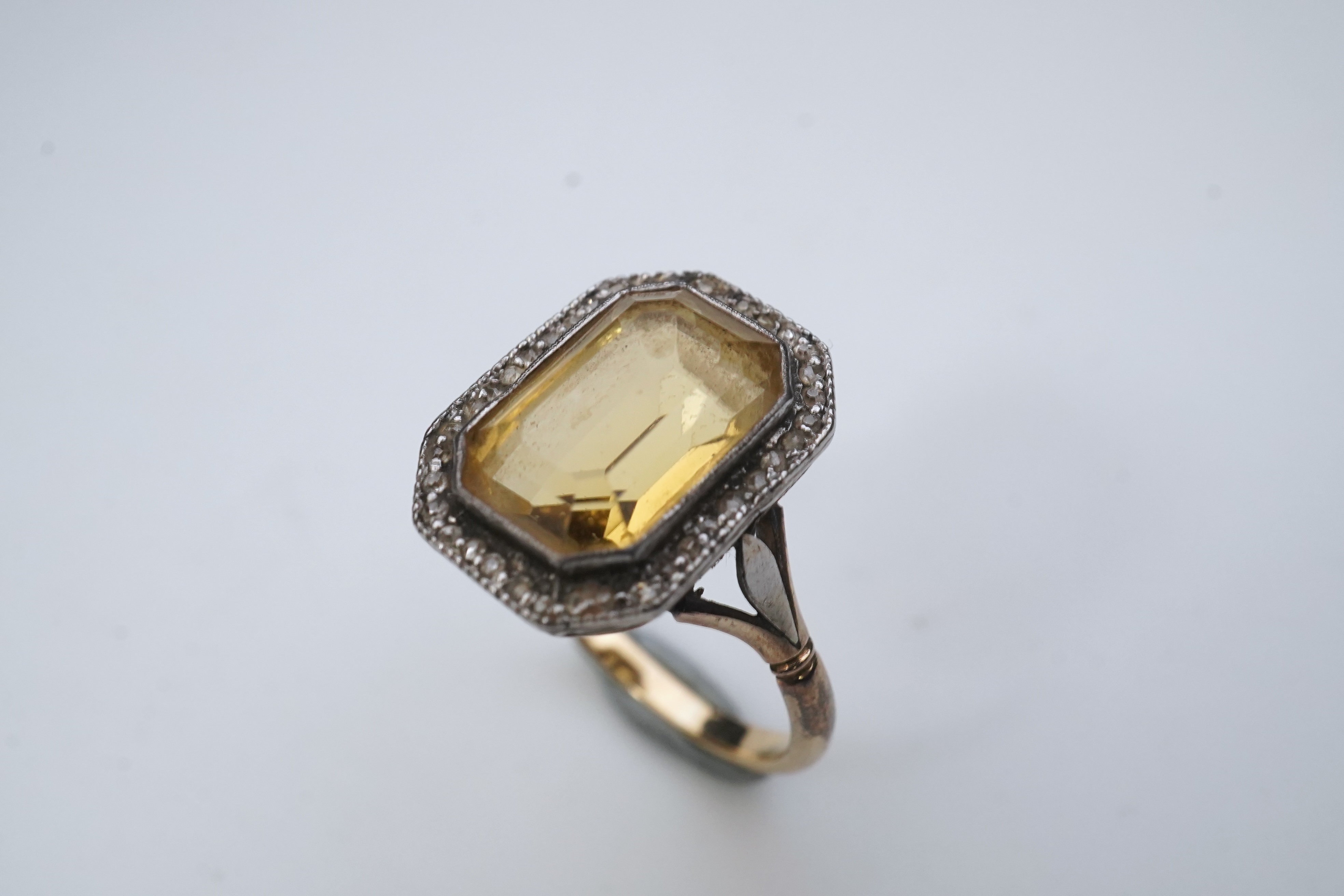 A citrine and diamond ring, early 20th century